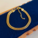 PULSEIRA TELA BANHADA OURO 18K